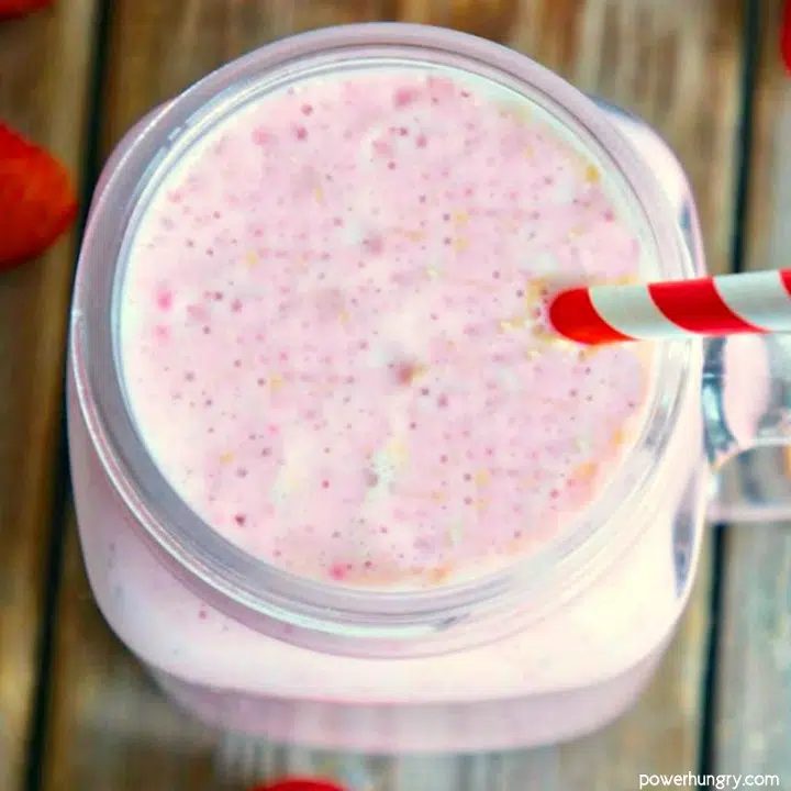 glass mug full of strawberry cashew smoothie