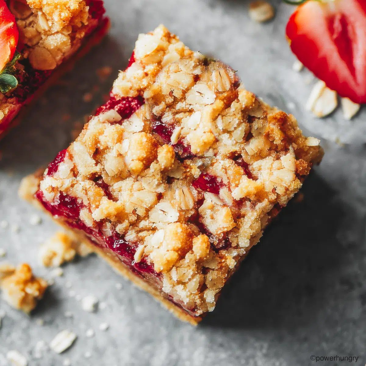 strawberry oatmeal bar on grey surface
