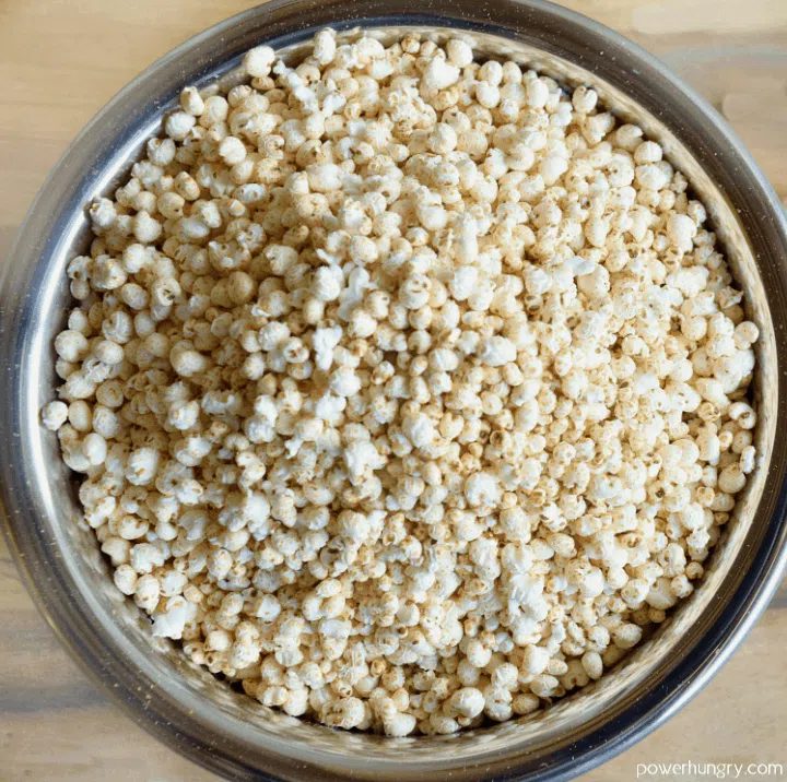 overhead shot of puffed millet in a glass jar