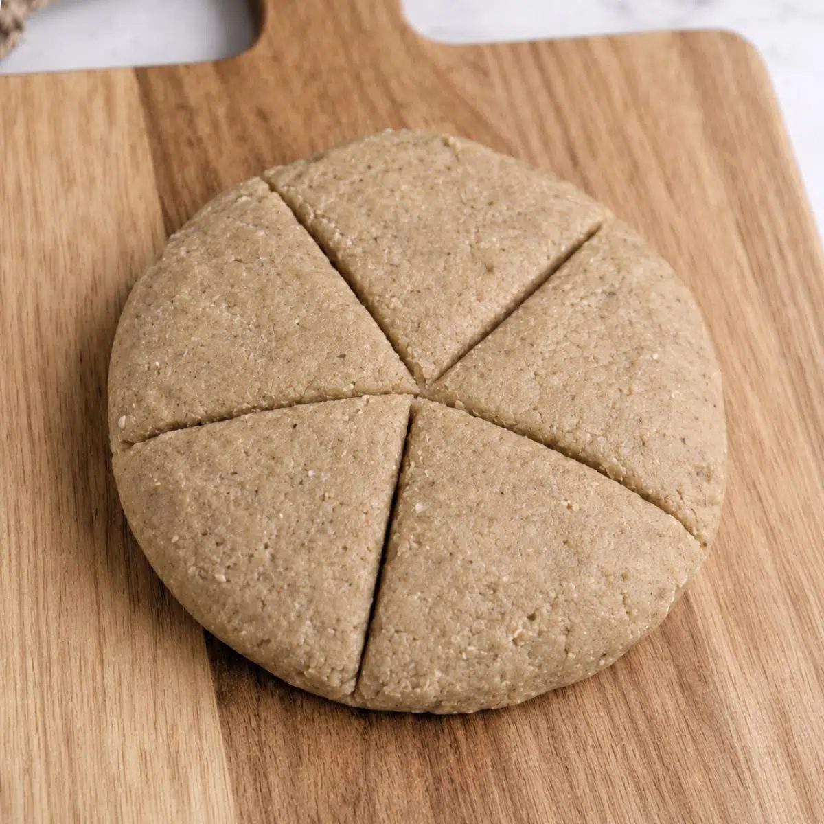 sunflower seed tortilla dough, portioned into 5 pieces