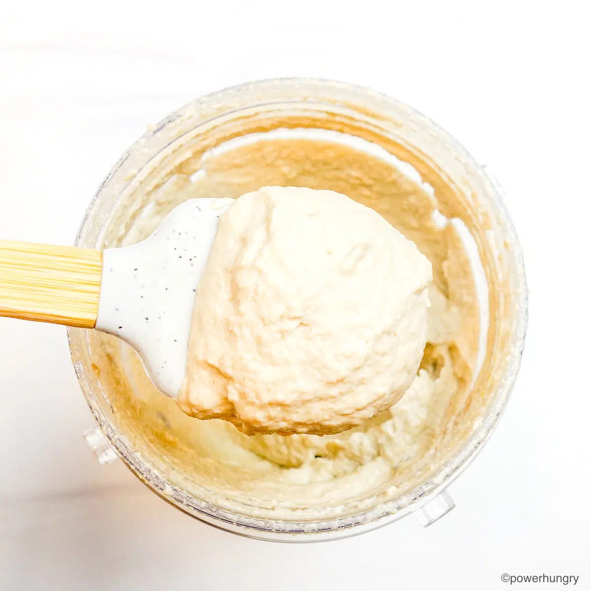 blender jar filled with sunflower seed whipped cream