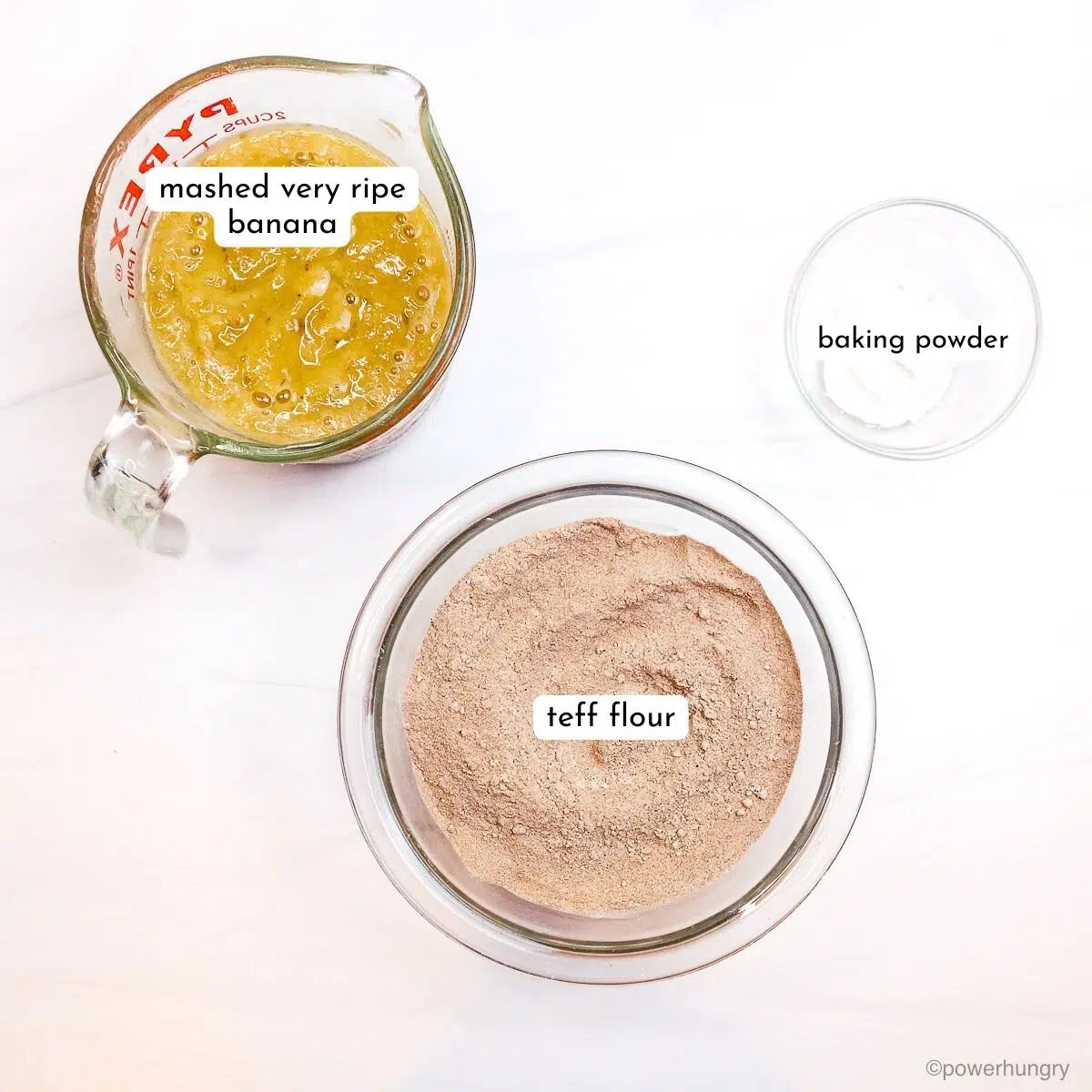 teff banana bread ingredients on a white surface