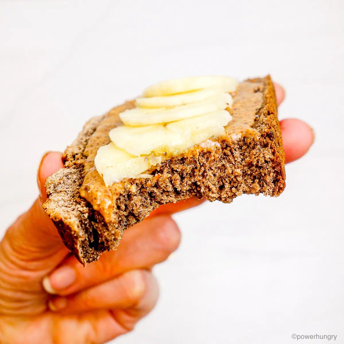 slice of teff banana bread with a bite taken out