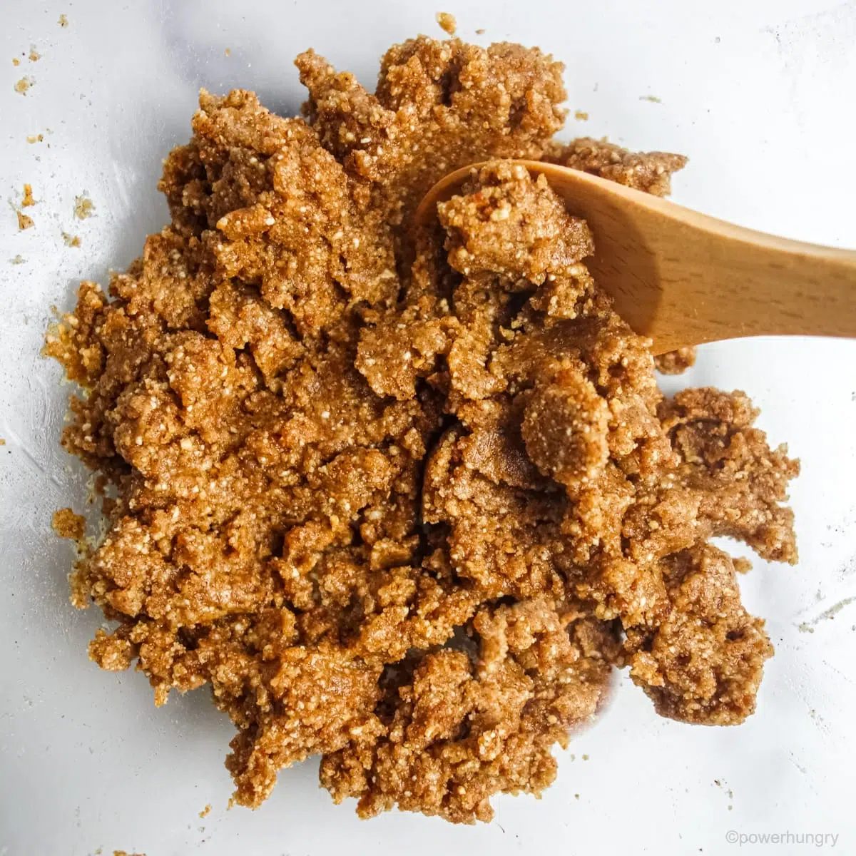 a glass bowl filled with vegan ginger cookie dough