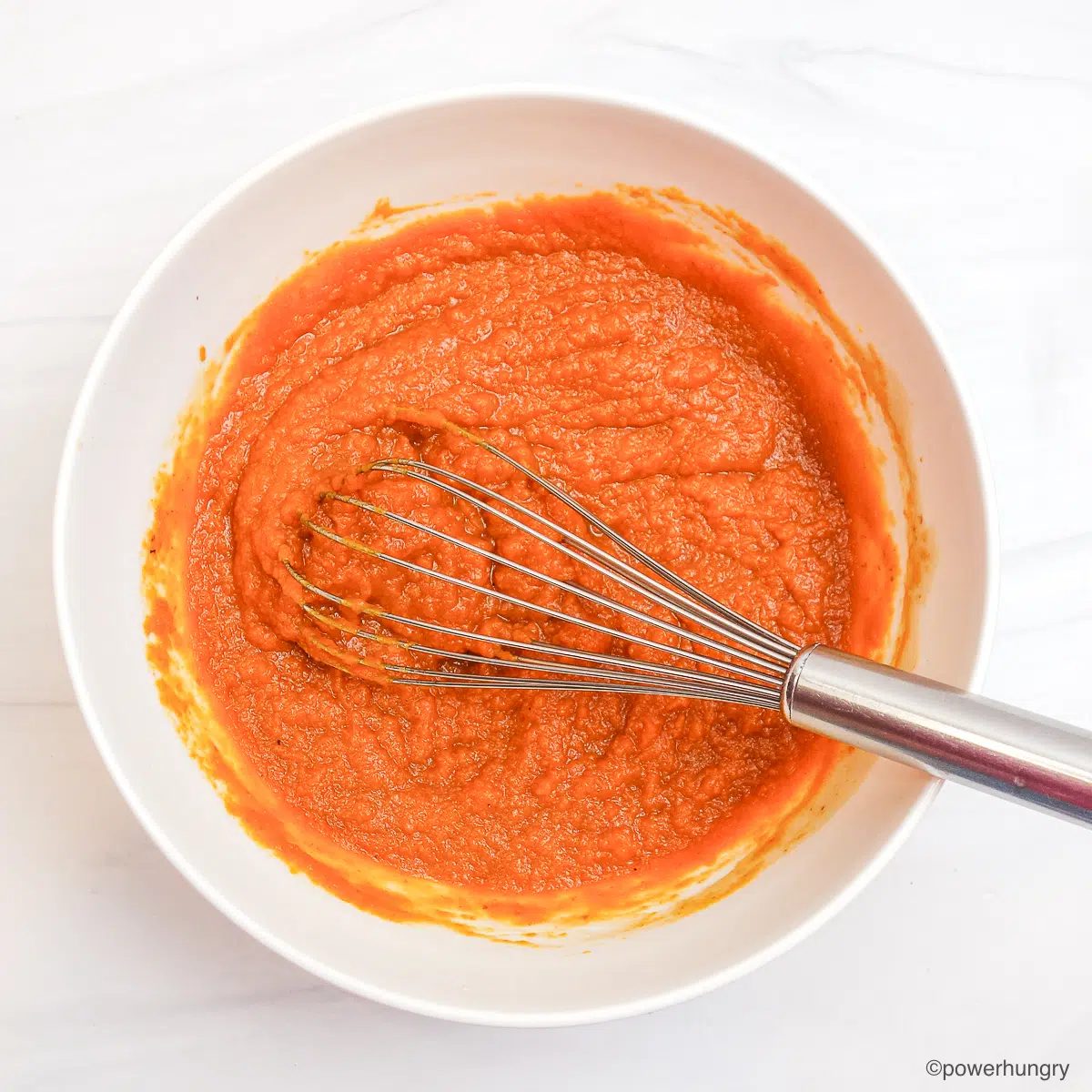 Pumpkin and maple in a white bowl