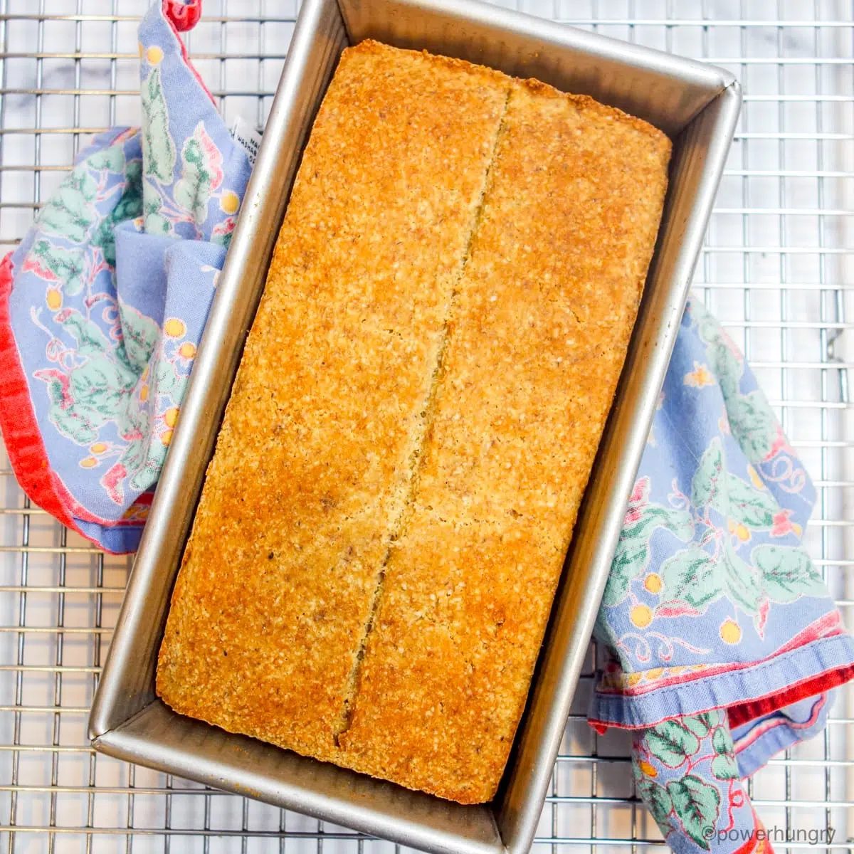 baked almond flour bread on a cooling rack