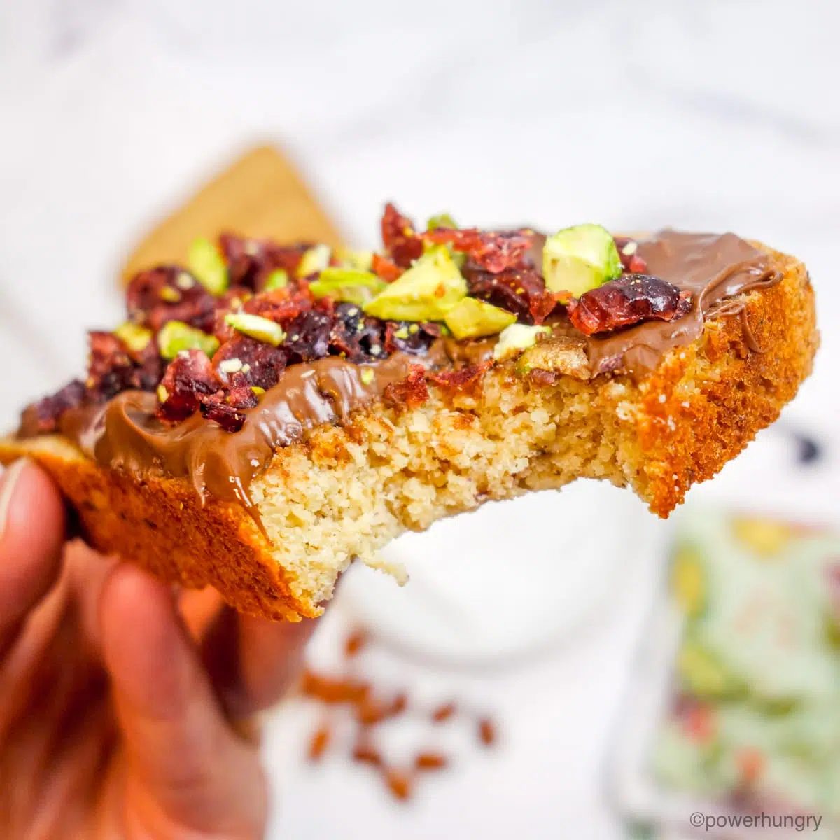 a slice of vegan bread with a bite taken out