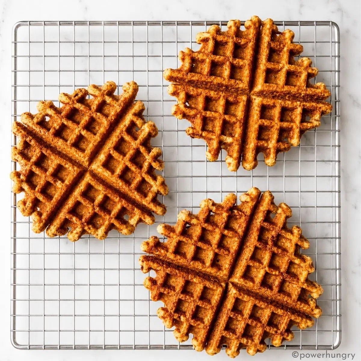 vegan almond flour waffles on a cooling rack