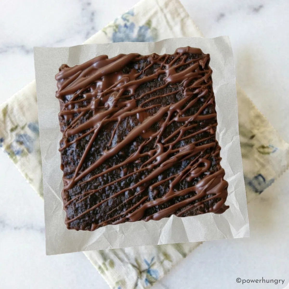 overhead shot of a single vegan carob almond flour brownie