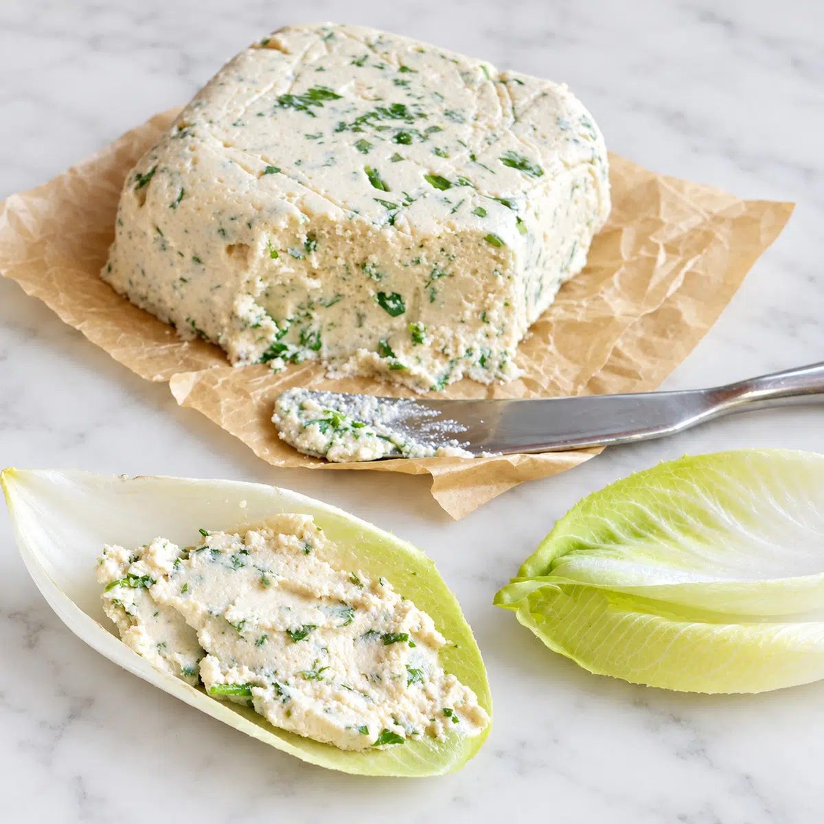 vegan Boursin cheese with endive leaves
