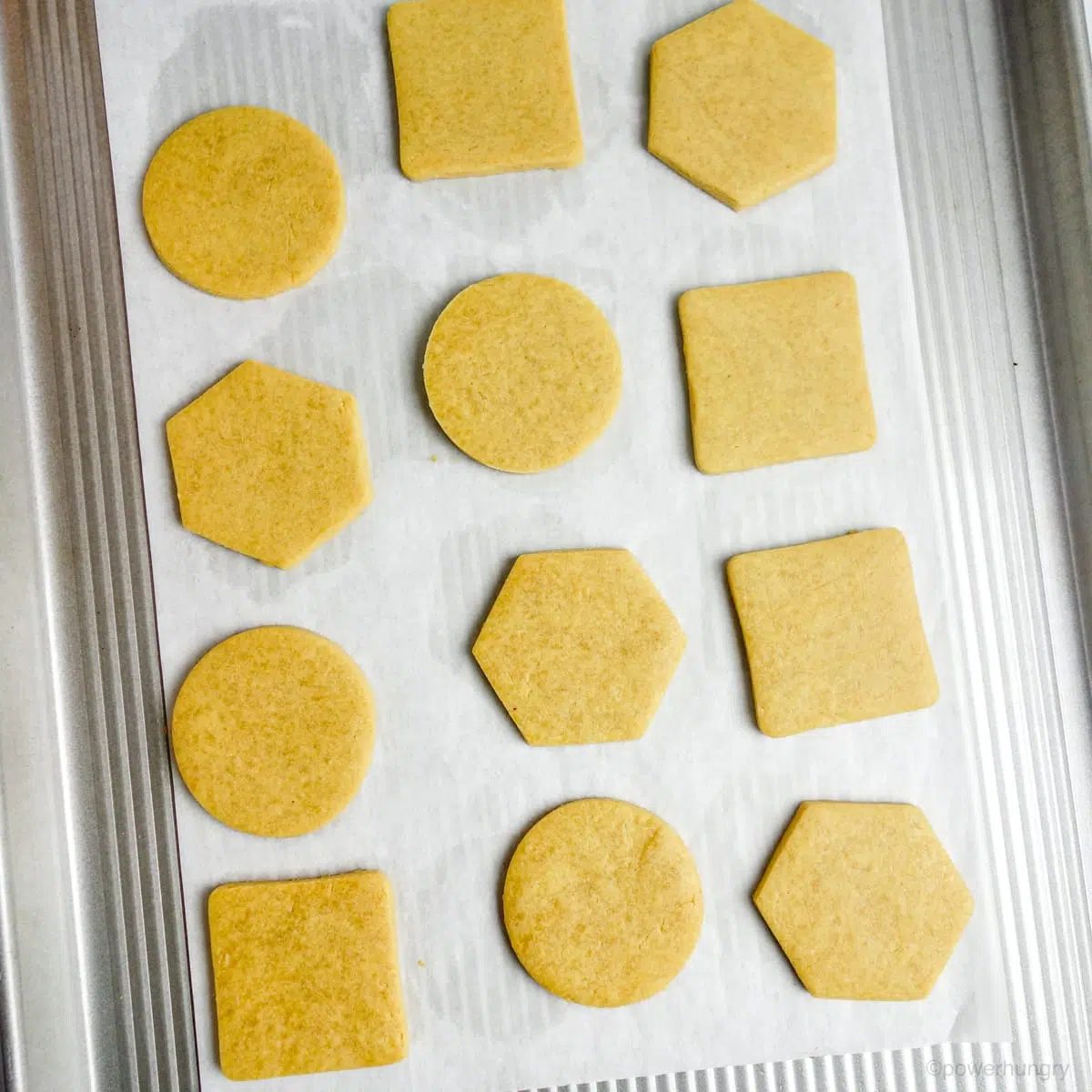 baked chickpea flour cut-outs on a baking sheet