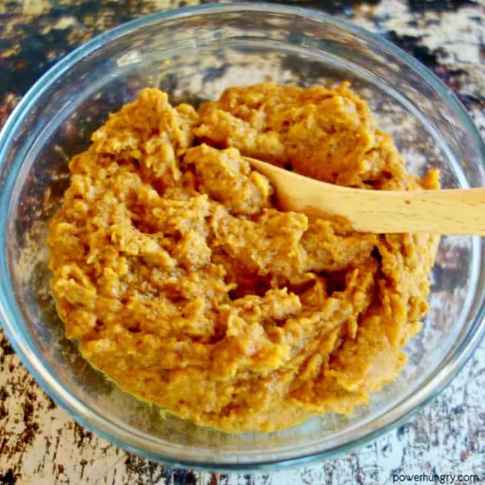 glass bowl full of chickpea flour pumpkin cookie dough