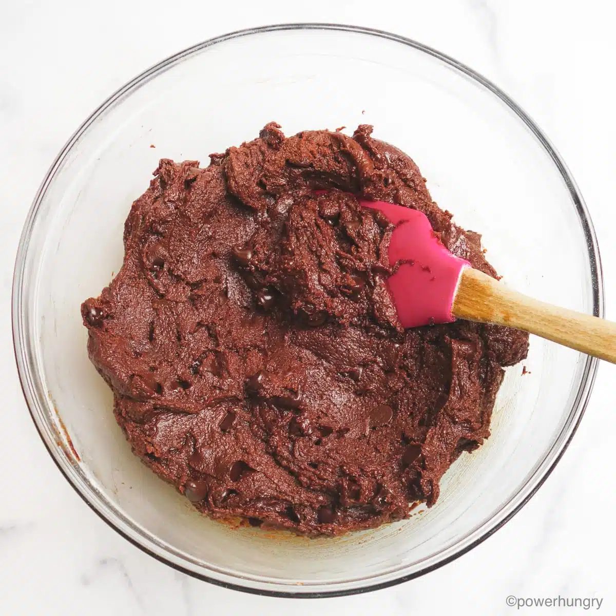 chocolate avocado coconut flour cookie dough in a glass bowl