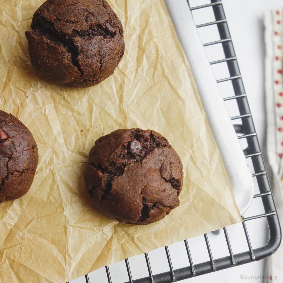 Baked chocolate buckwheat cookies on a baking sheet