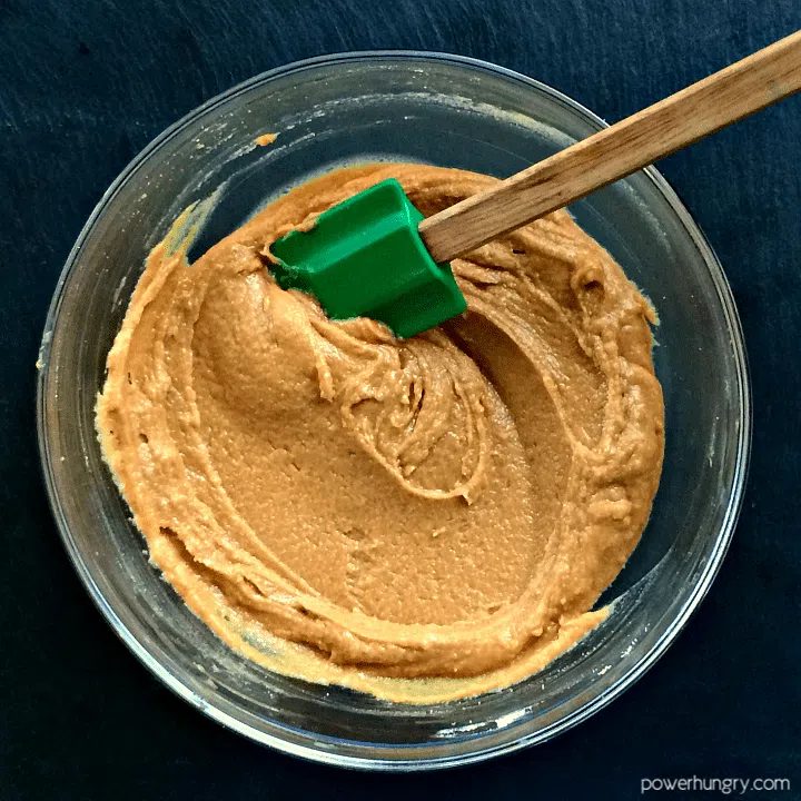 glass bowl filled with cookie dough for cookie brittle