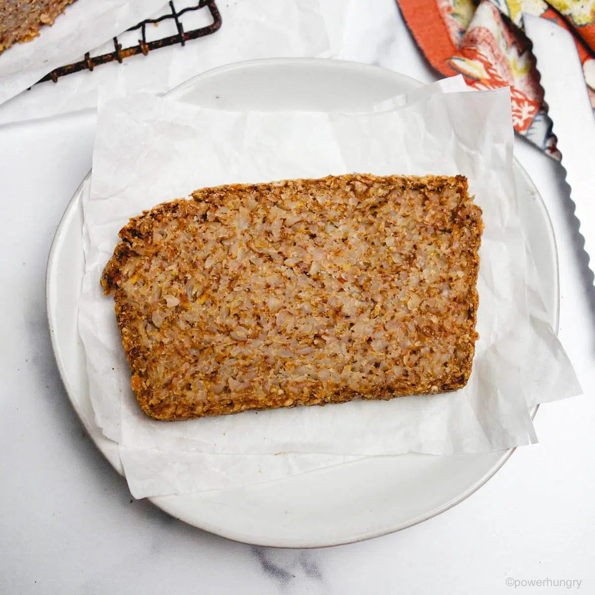slice of toasted vegan cinnamon bread on a white plate