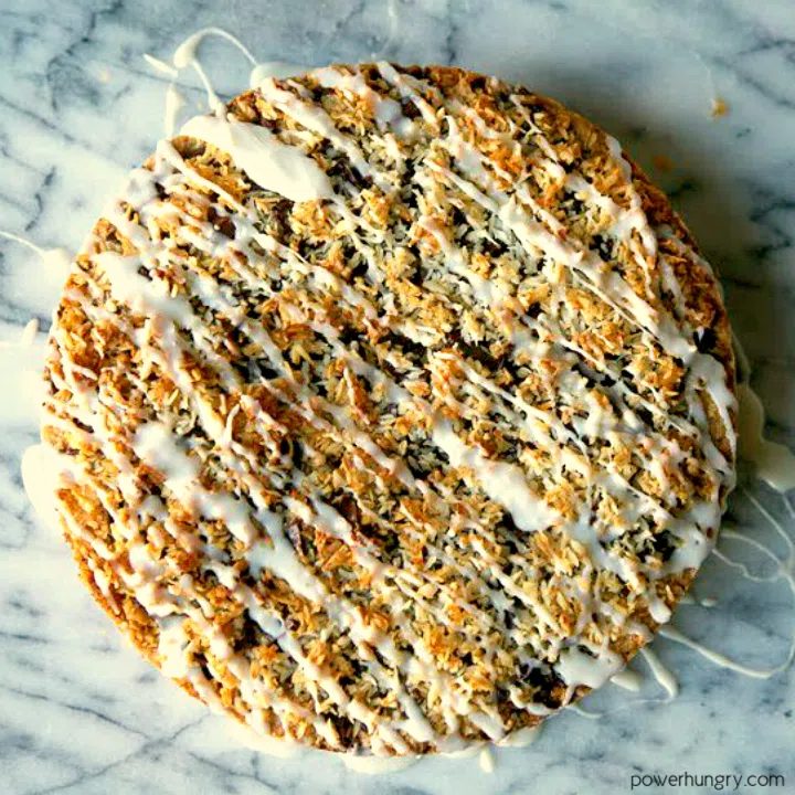 baked coconut almond flour cake with an icing drizzle