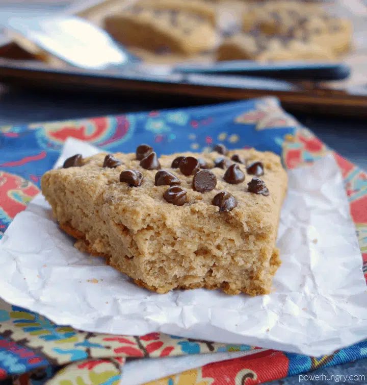 close-up of a banana coconut flour on white parchment paper atop a colorful napkin