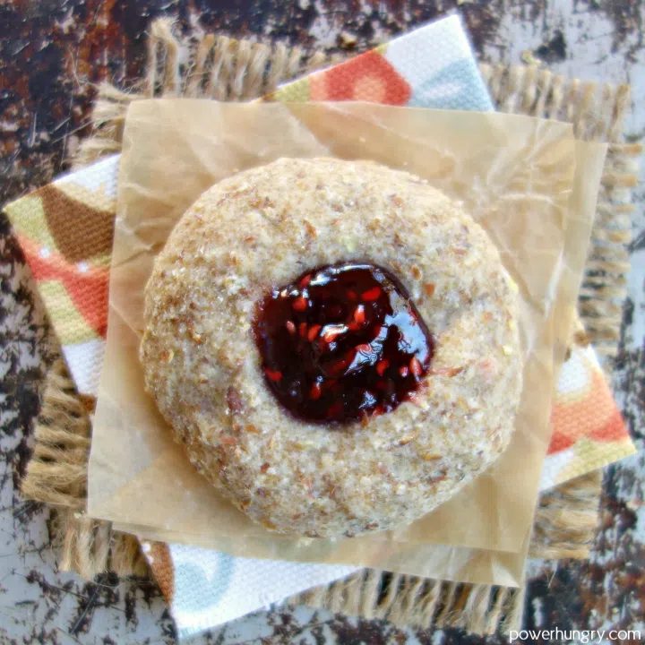 overhead shot of a raspberry jam thumbprint cookie