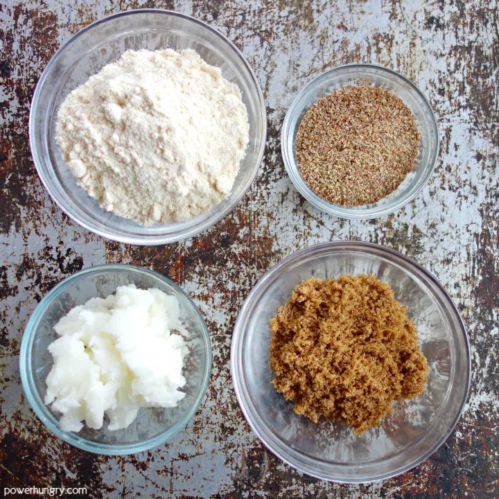 overhead shot of the 4 ingredients needed to make coconut flour cookies