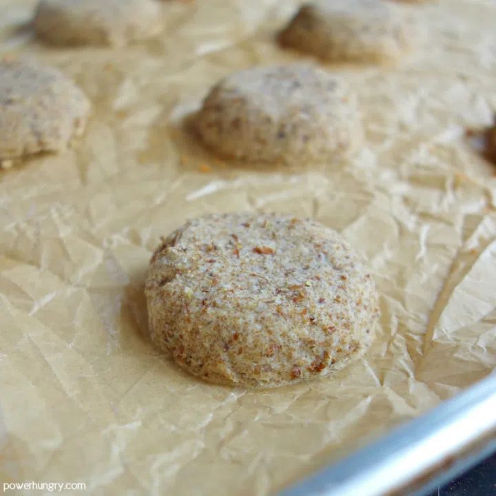 baked cookies on a parchment paper-lined baking sheet