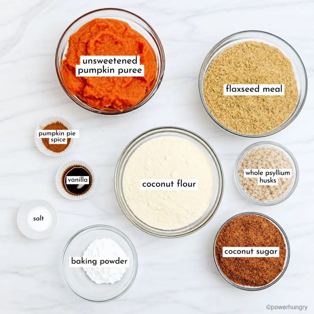 ingredients in glass prep bowls for vegan coconut flour pumpkin bread