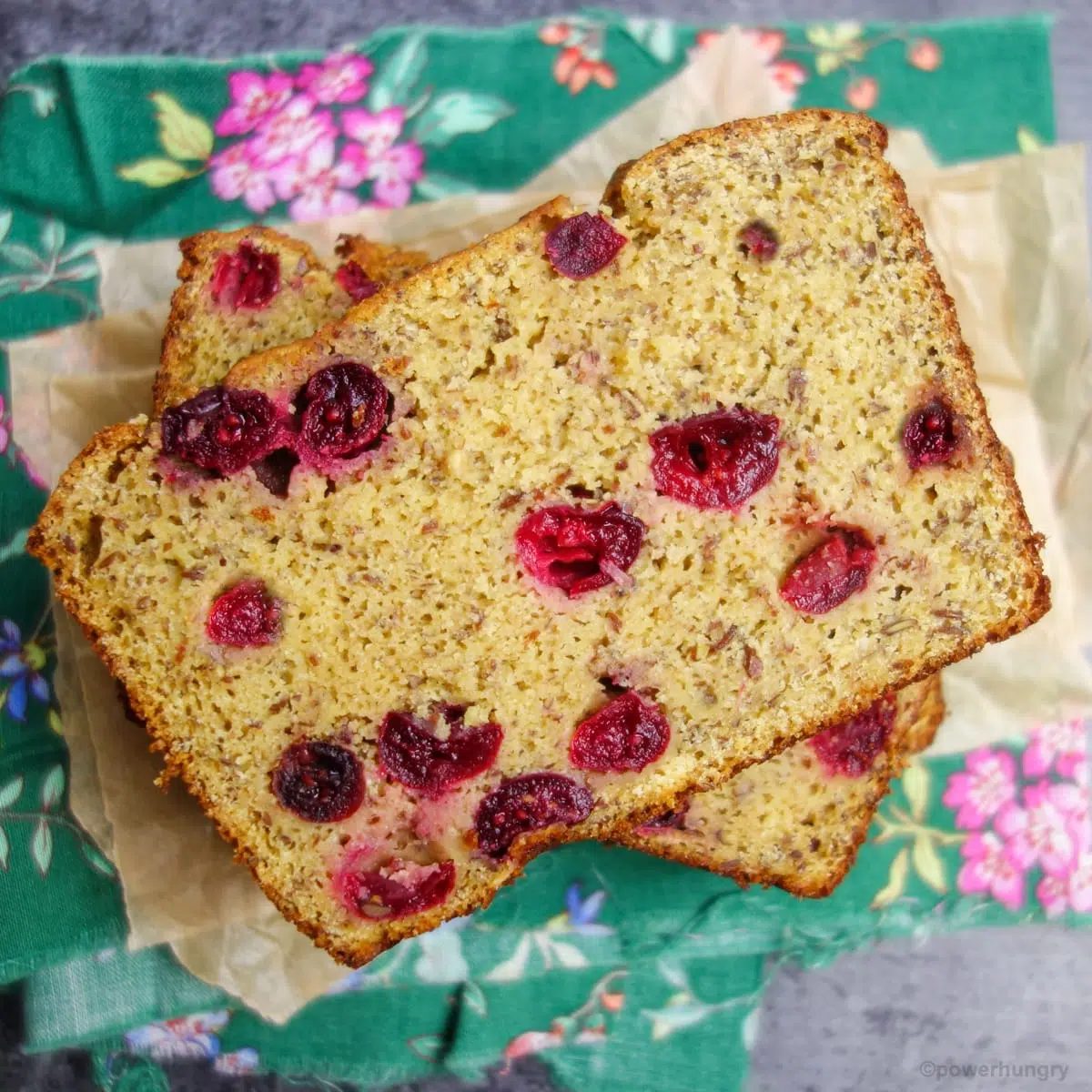 stack of sweet loaf slices on.a green floral napkin