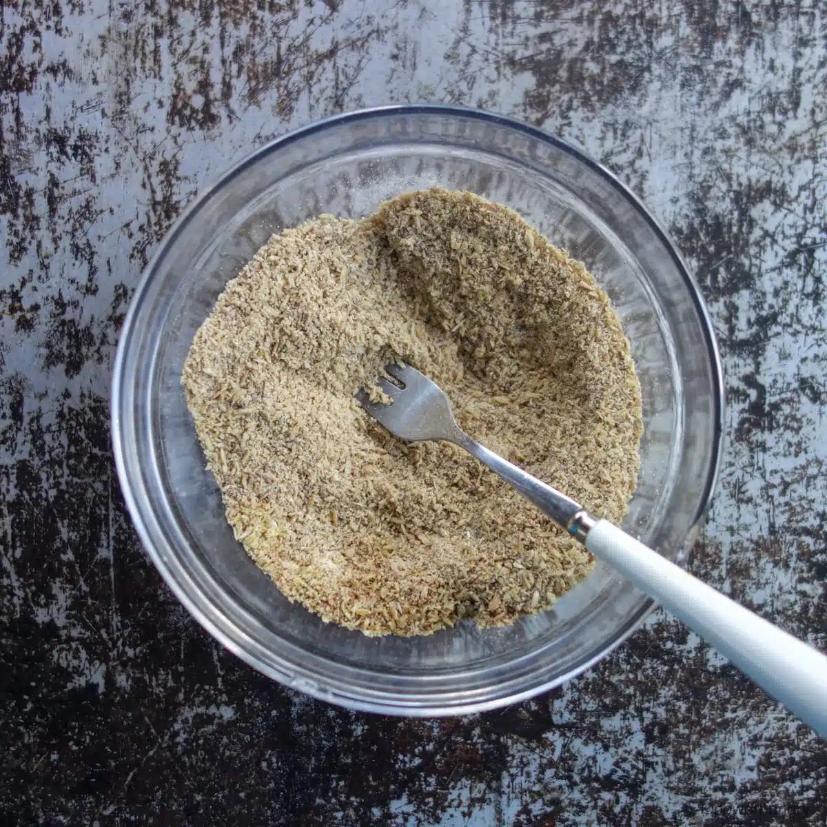 dry ingredients for flax muffin in glass bowl