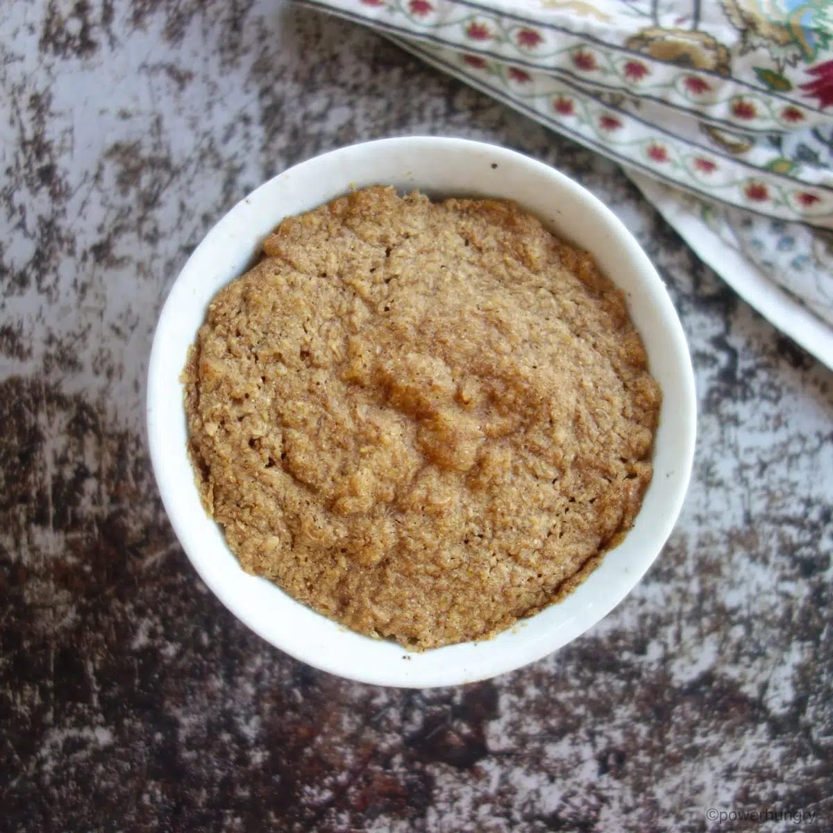 microwaved flaxseed muffin in a white bowl