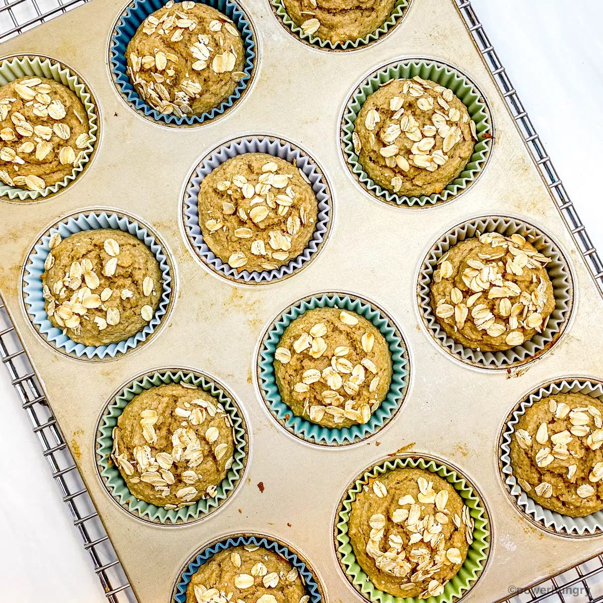 baking 3 ingredient banana oat muffins in a tin