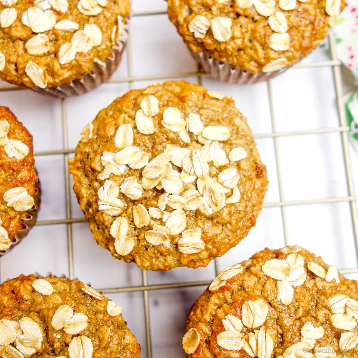 overhead shot of vegan GF banana oat muffins on a cooling rack