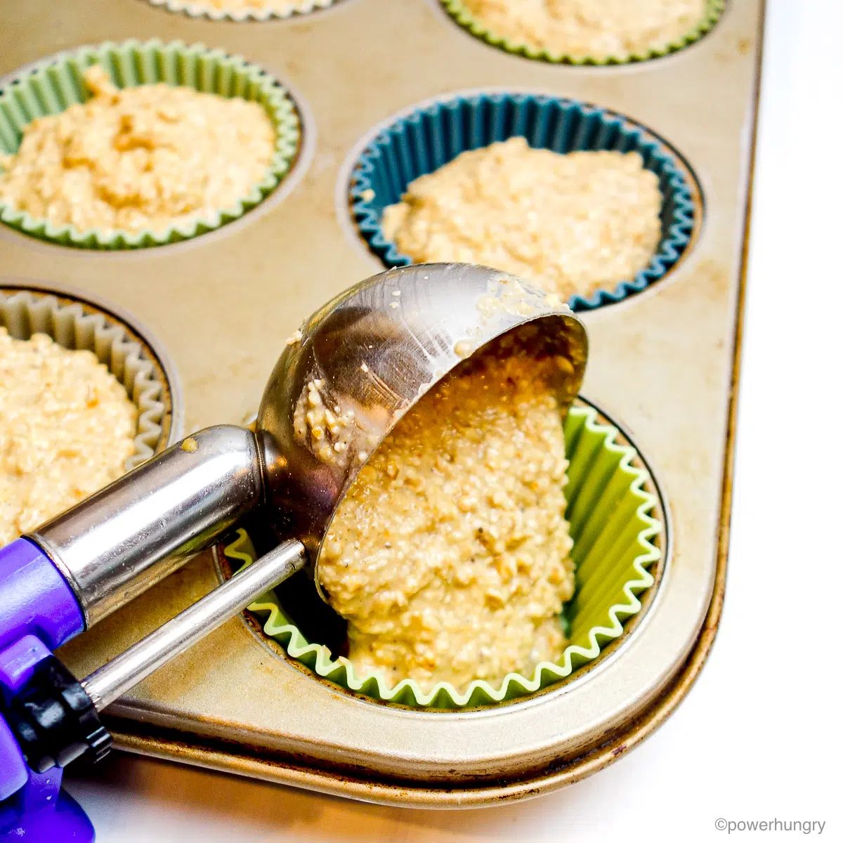 banana oat bran batter getting portioned