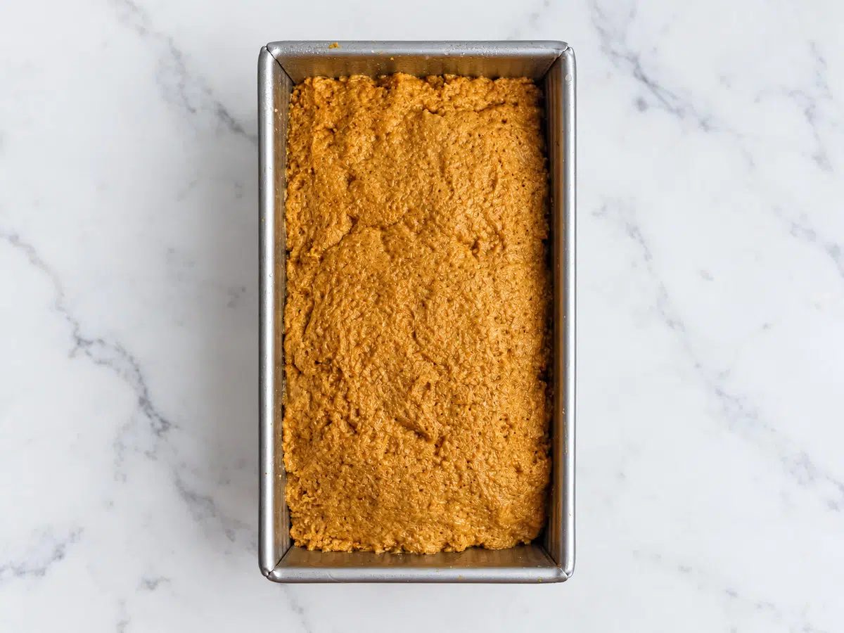 vegan almond flour pumpkin bread dough in loaf pan