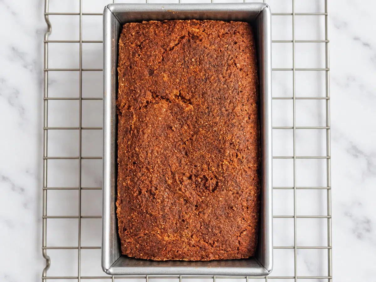 vegan almond flour pumpkin bread baked, In pan on cooling rack