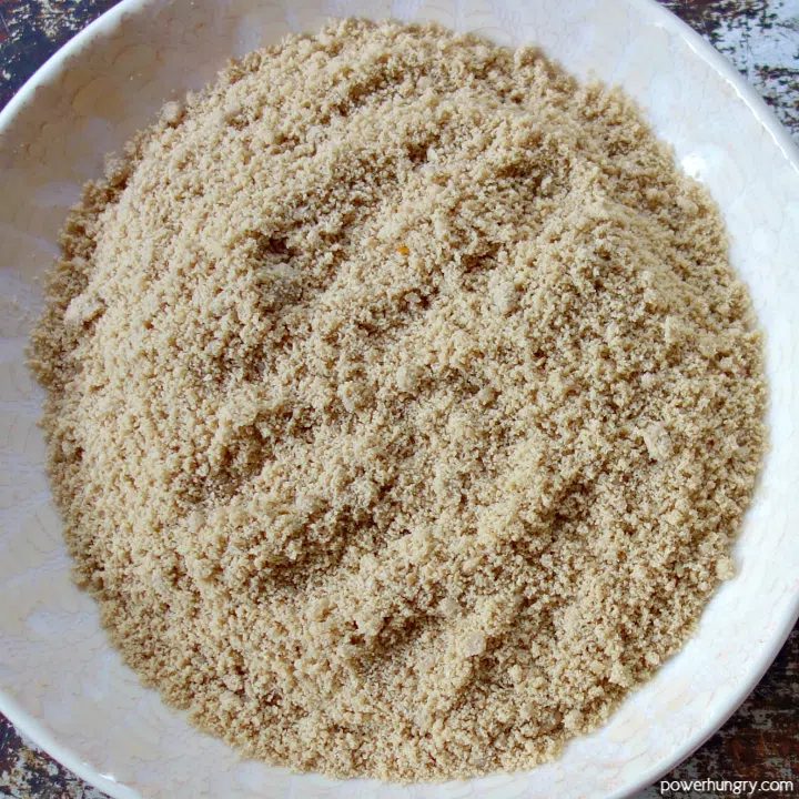 raw sunflower seed flour in a white bowl