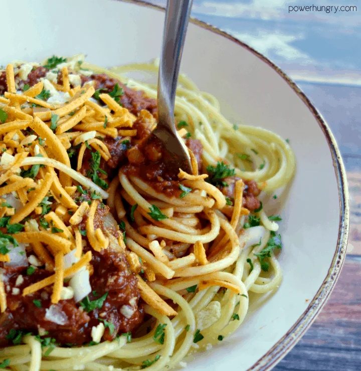 Fork swirling a portion of Cincinnati Chili