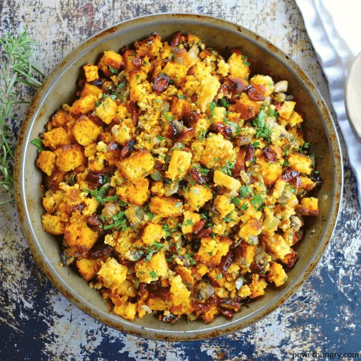 Overhead shot of Grain-free & vegan cornbread stuffing in an antique pie plate