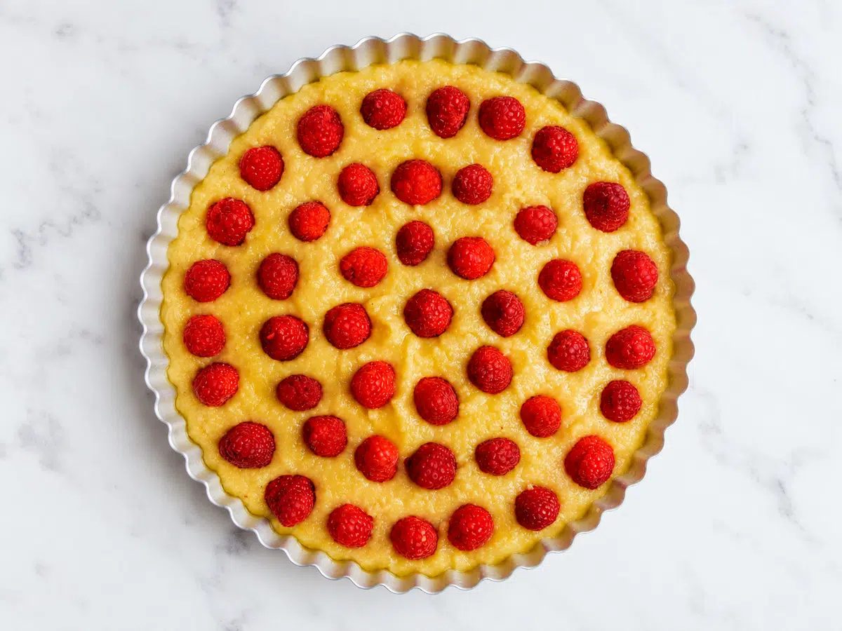 unbaked crustless frangipane tart with raspberries