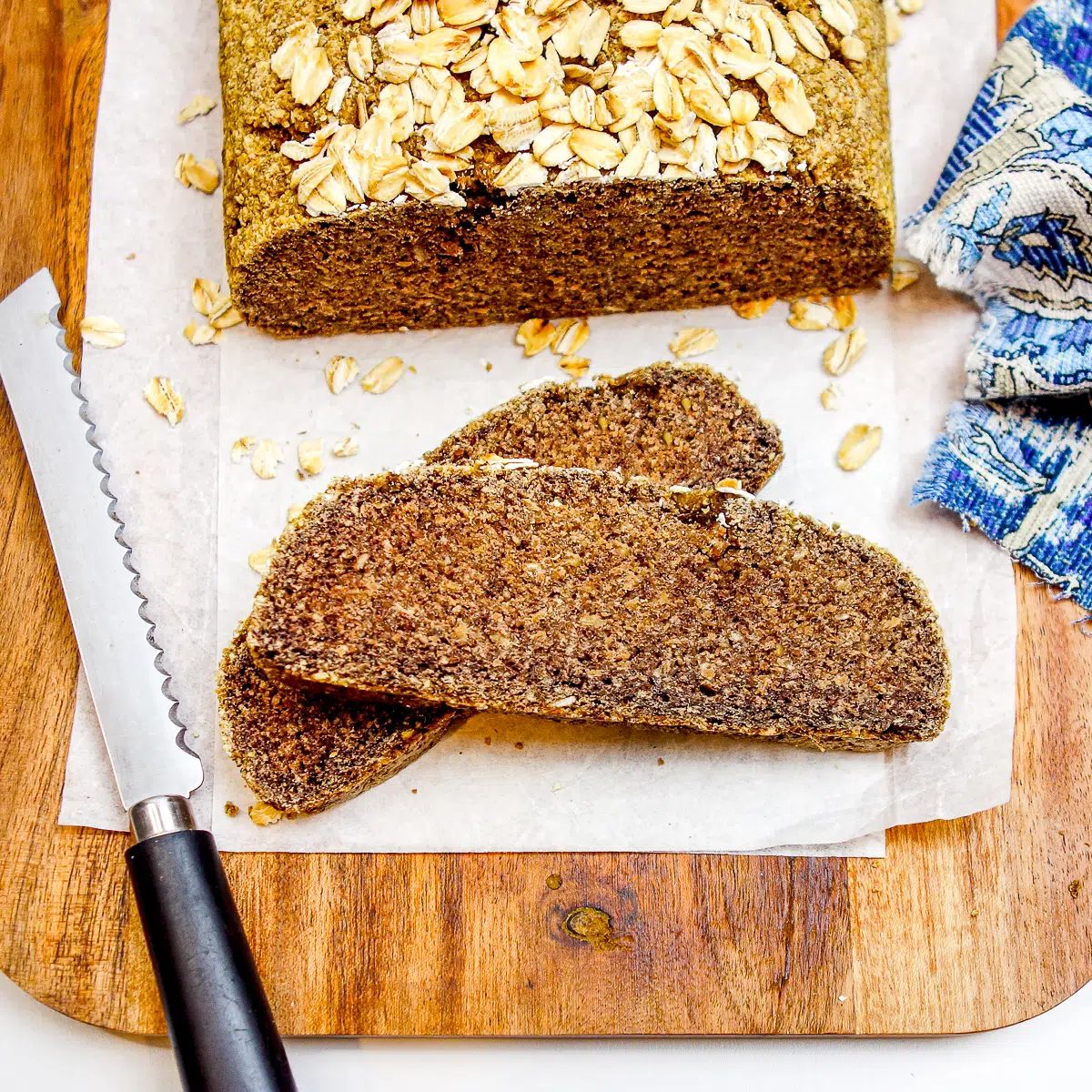 slices of straightforward high protein oat bread on a cutting board