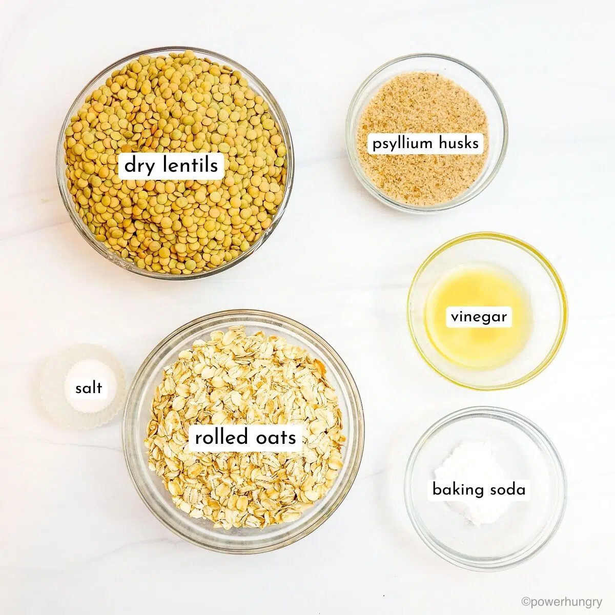 small bowls filled with the ingredients for oat protein bread