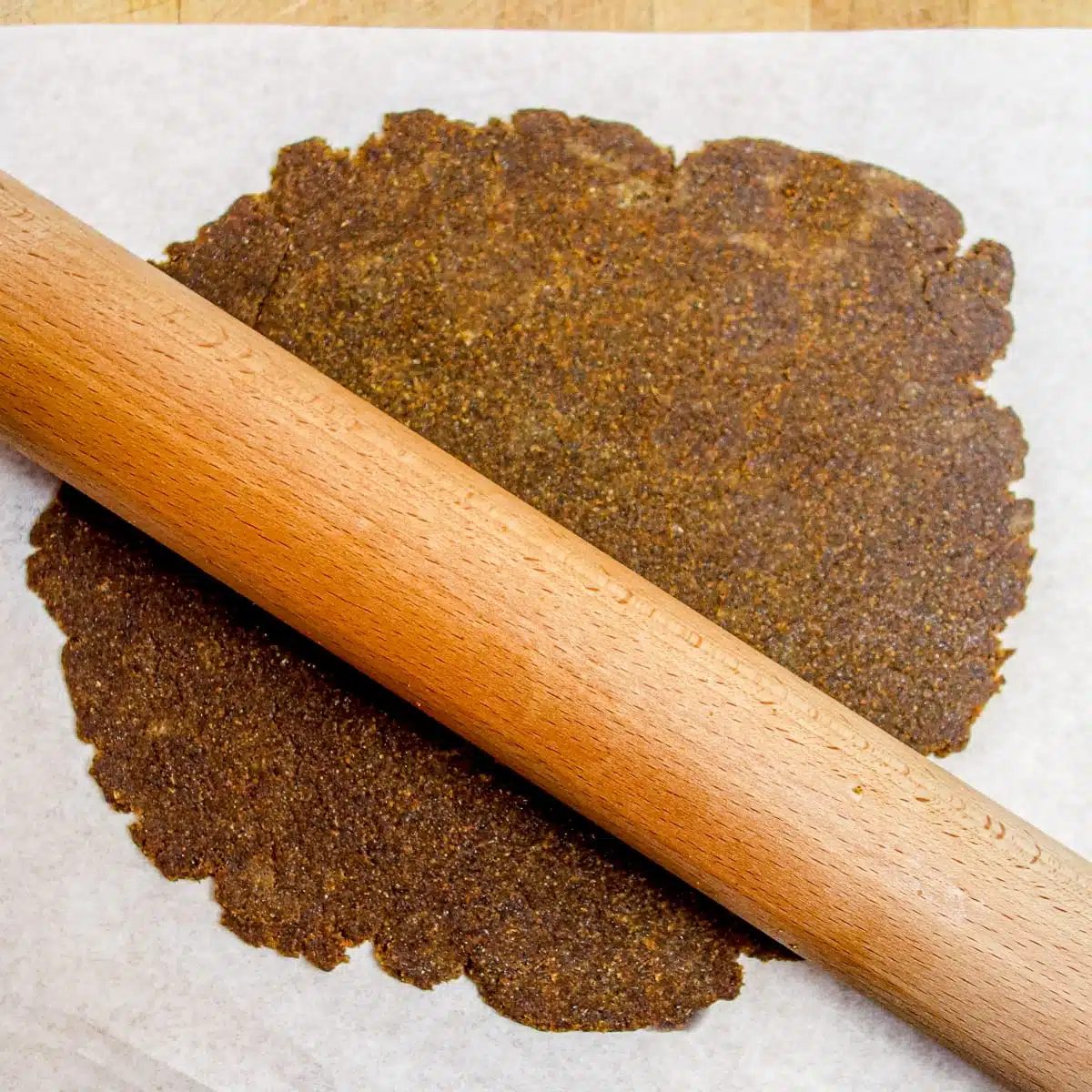 gingerbread dough getting rolled out