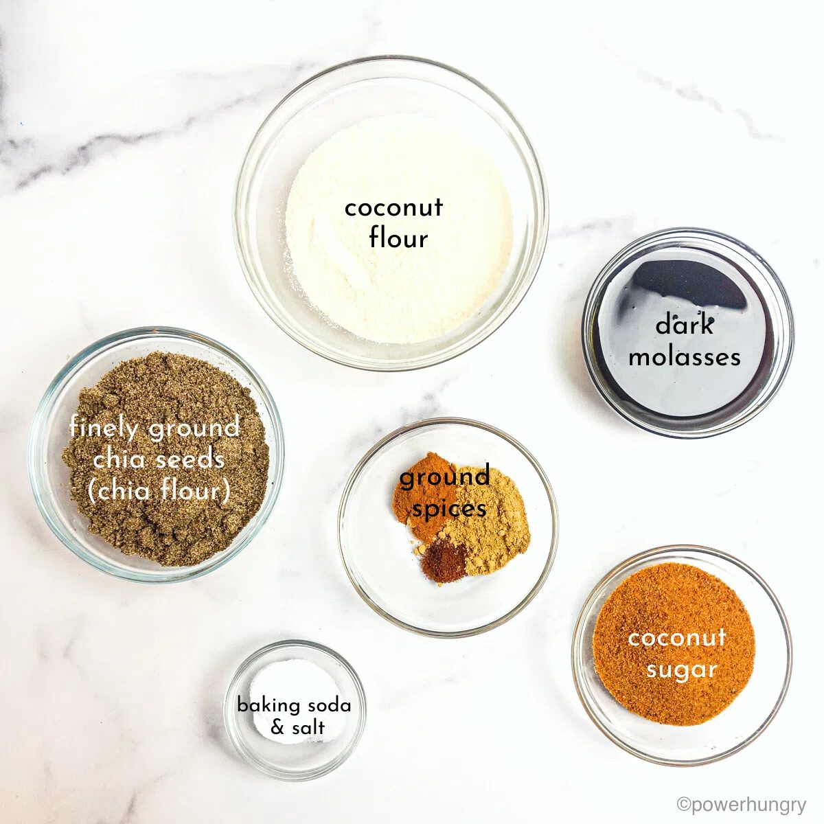 ingredients for vegan gingerbread cookies in glass bowls