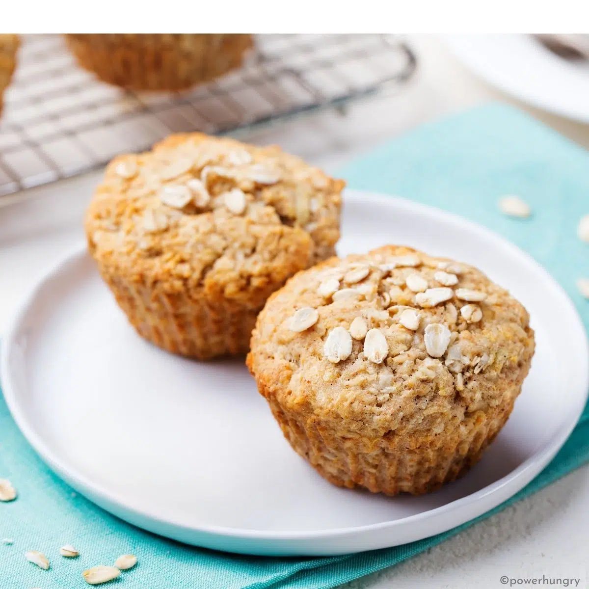oat flour muffins on a white plate