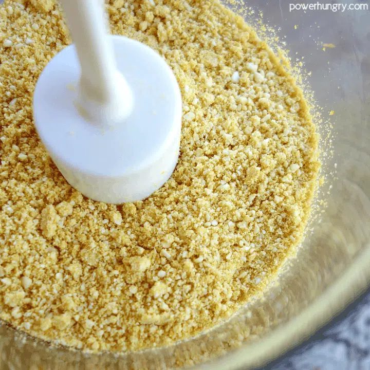 food processor full of diy vegan parmesan cheese