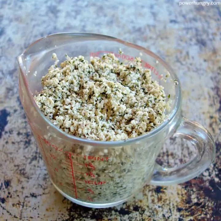 soaked and drained hemp hearts in a glass measuring cup