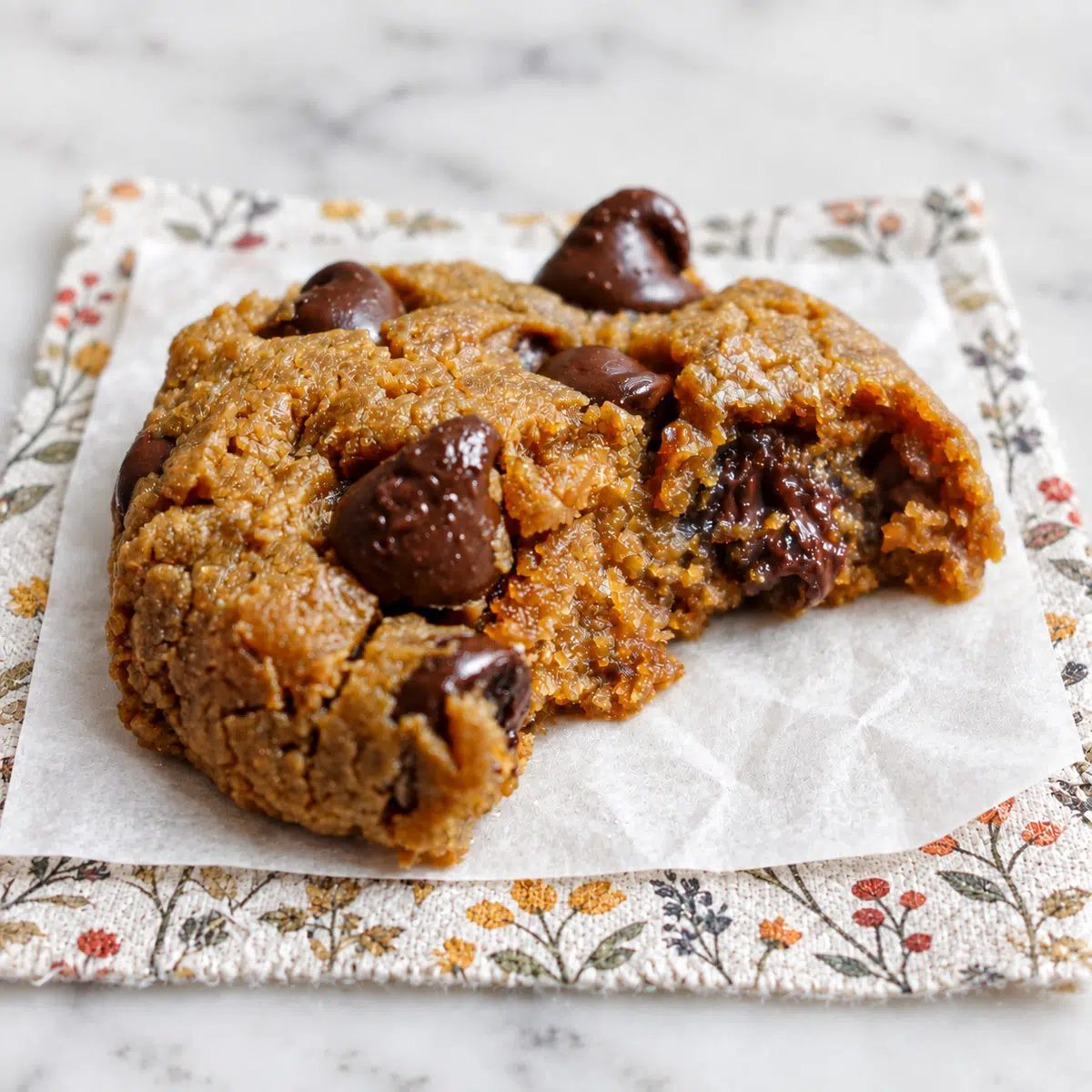 sunflower seed butter chocolate chip cookie with a bite taken out