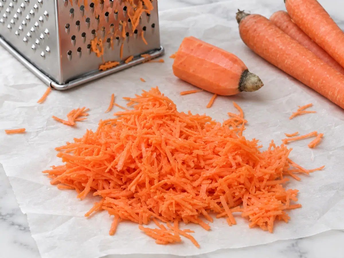 grated carrots on parchment paper