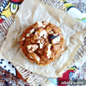 A vegan pumpkin chickpea flour cookie on a piece of parchment