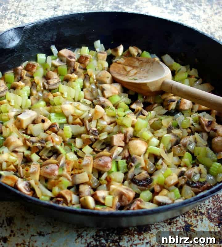 Vegan Cornbread Stuffing, Grain-Free and Guilt-Free 6 Sautéed onions, mushrooms, and celery in a cast iron skillet
