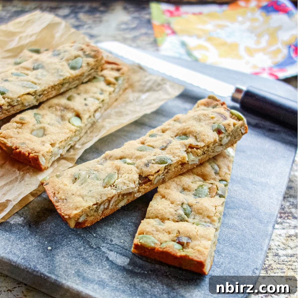 Simple Three Ingredient Vegan Grain Free Almond Flour Granola Bars 3 Six grain-free 3 ingredient almond flour granola bars on a wooden cutting board